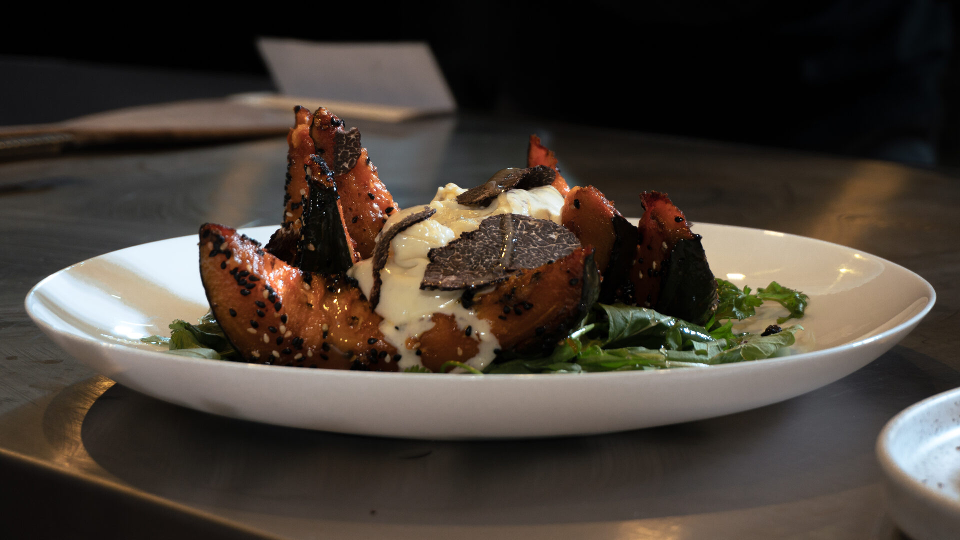 Calabaza asada con burrata y trufa